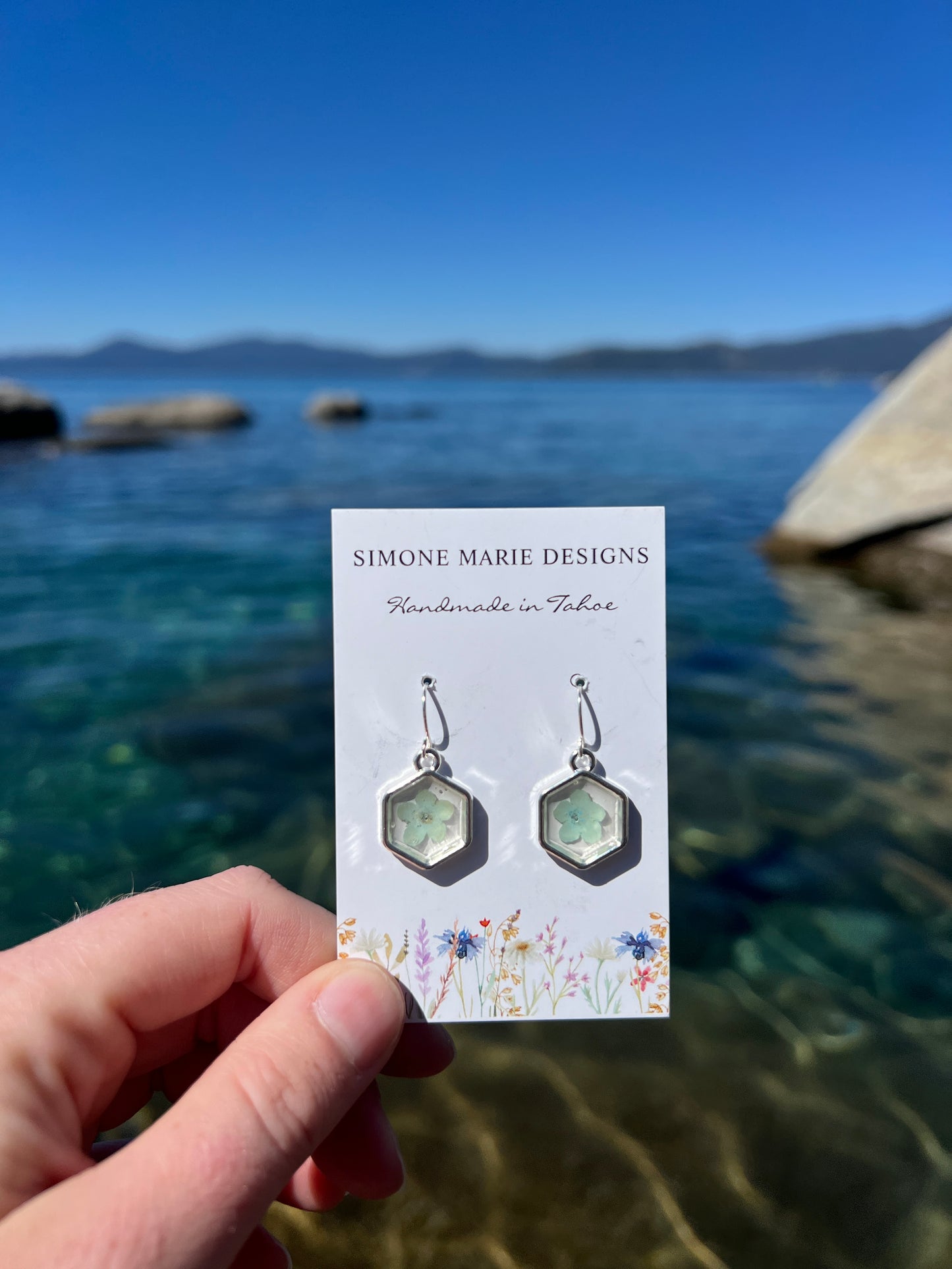 Baby blue forget-me-not in silver hexagon