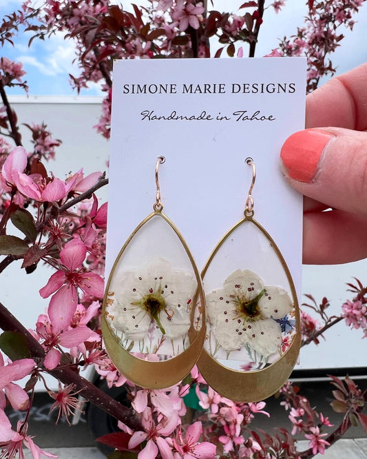 White cherry blossom in tear drop bezel